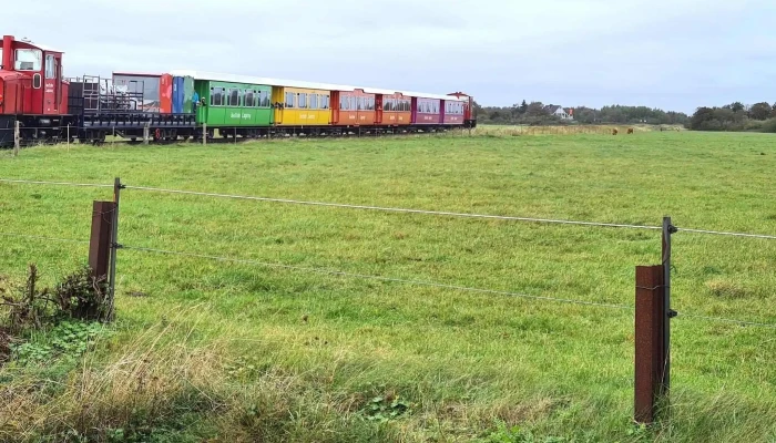 Inselbahn Langeoog -    Schiffahrt Langeoog Fotos - Langeoog